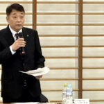 開会にあたり加藤勝信会長のご挨拶を代読される川﨑雅雄副会長